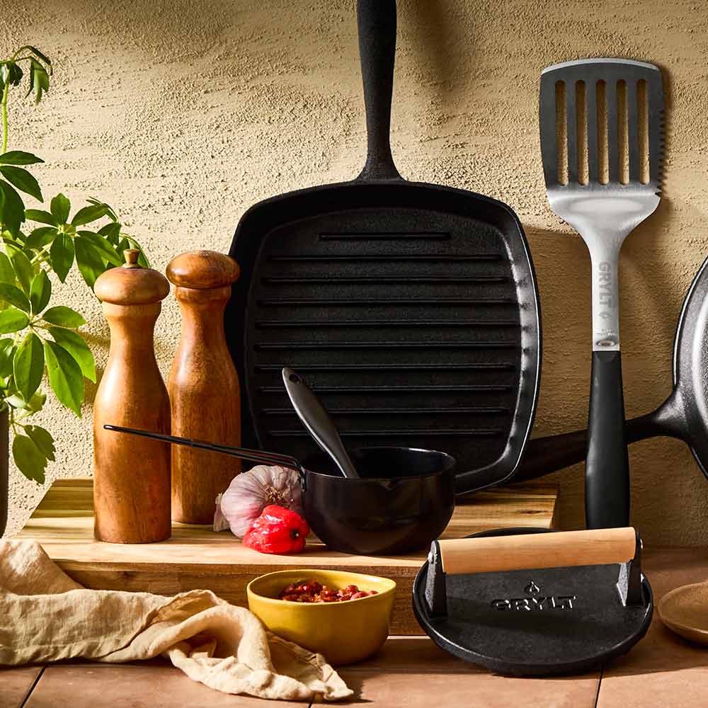 collection of outdoor cooking pans utensils and accessories - MyHouse