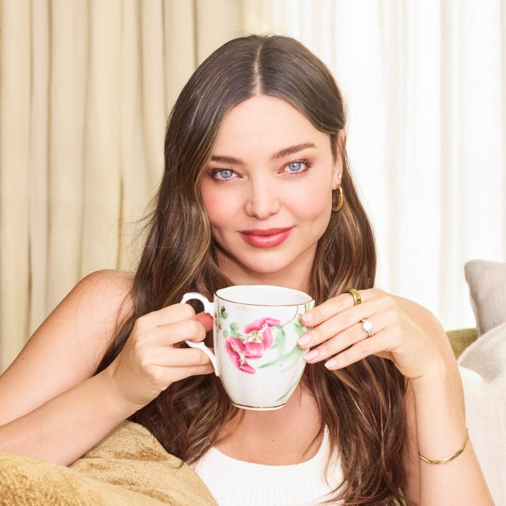 Miranda Kerr holding a mug