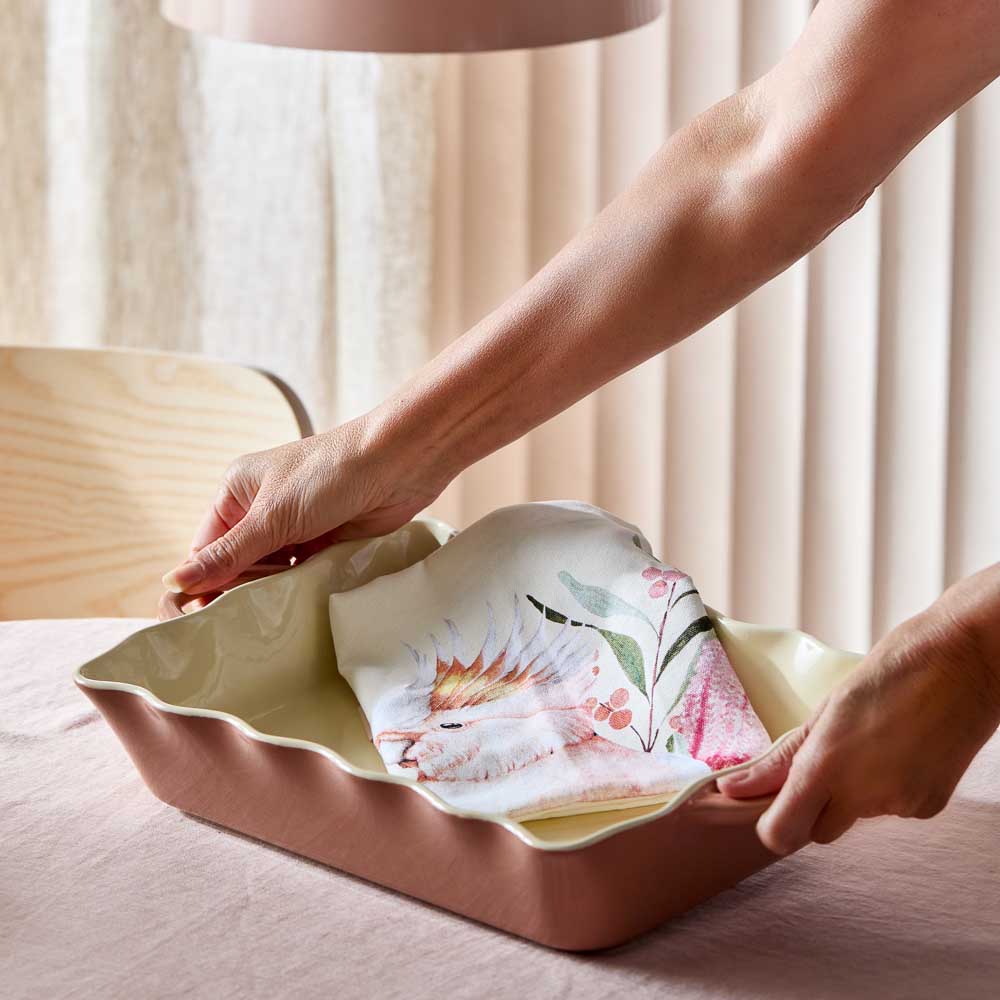 Woman holding Alex Liddy Posy Lasagne Dish 32cm Brown at MyHouse
