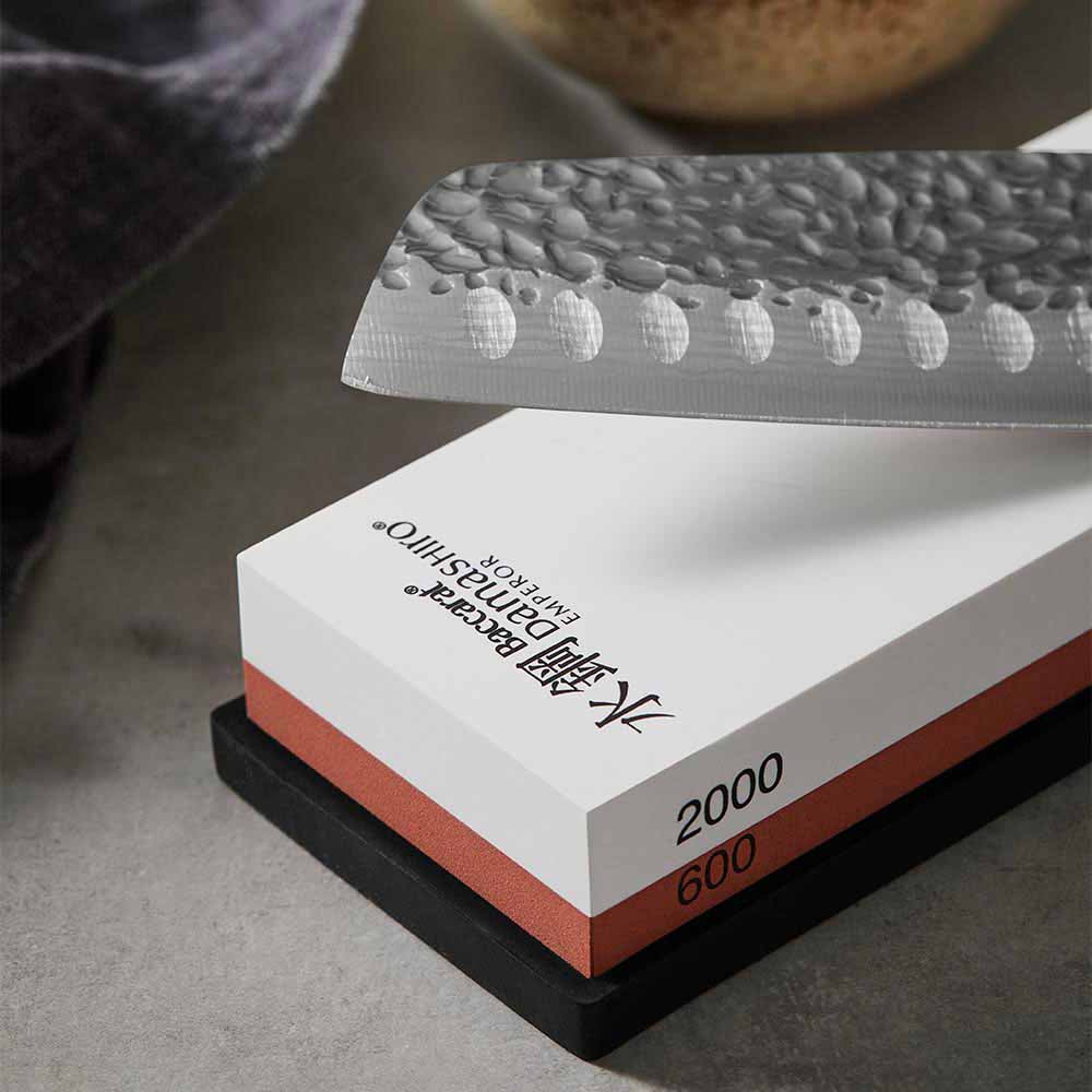 Close up of 600/2000 whetstone and santoku knife - MyHouse