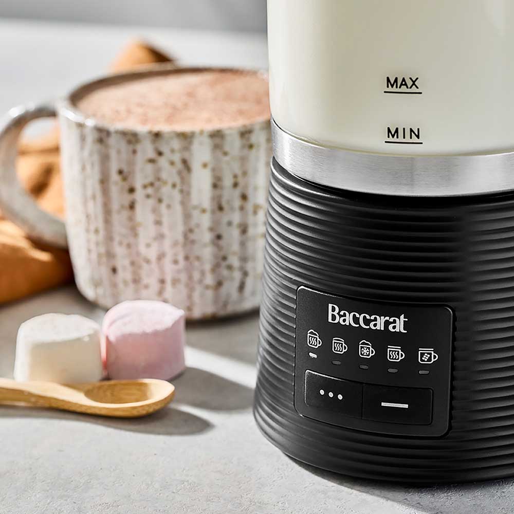 electric glass milk frother with hot chocolate and marshmallows