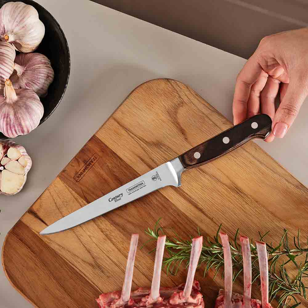 boning knife on chopping board with rack of lamb - MyHouse