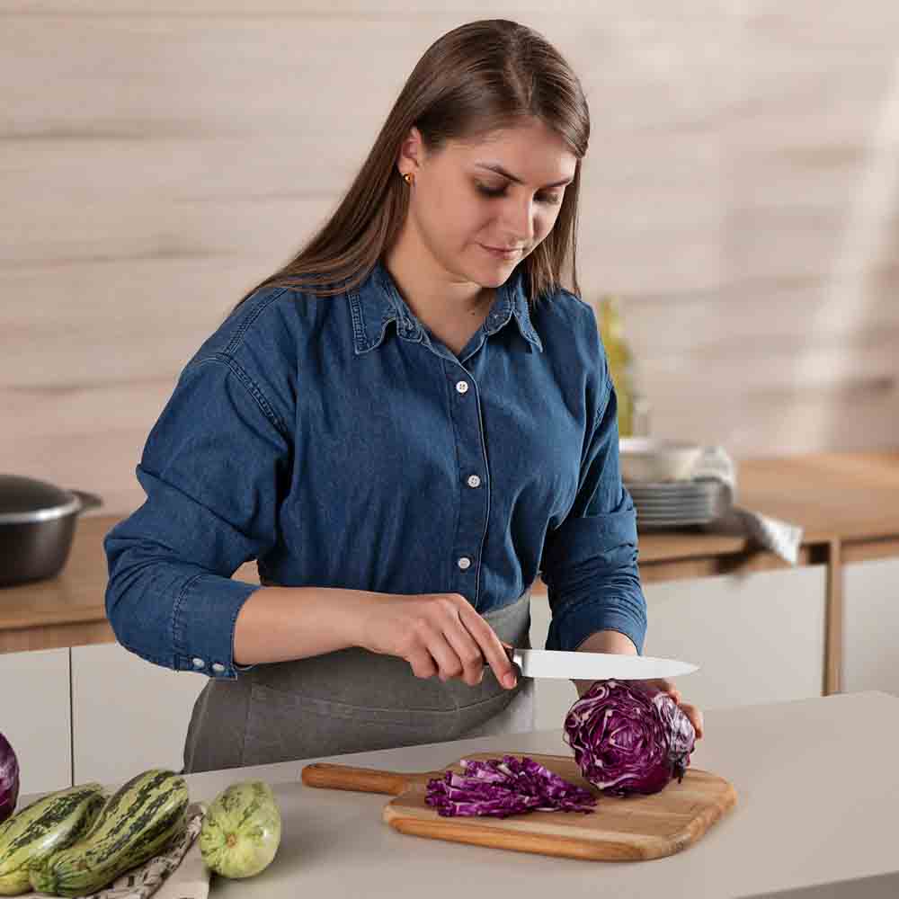 woman chopping cabbage with Utility Knife - MyHouse
