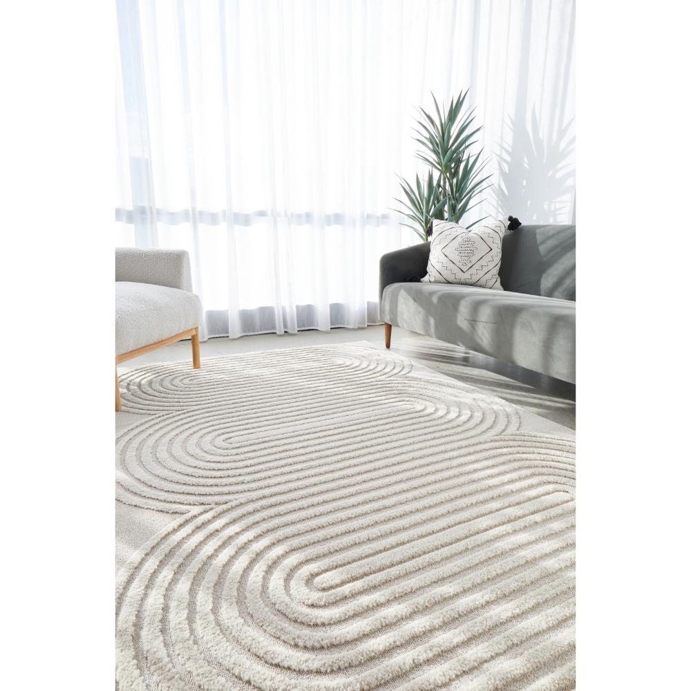 Rug Culture Lotus Carl Rug in beige at MyHouse. Rug with oval detail in lounge room