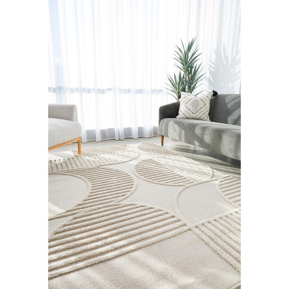 Rug Culture Lotus Leo Rug in Beige in lounge room at MyHouse
