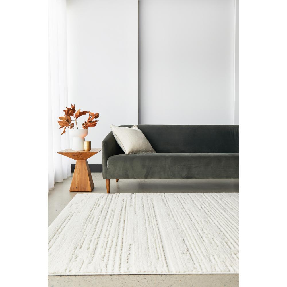 Rug Culture Serenade Ezra Rug White with grey couch at MyHouse