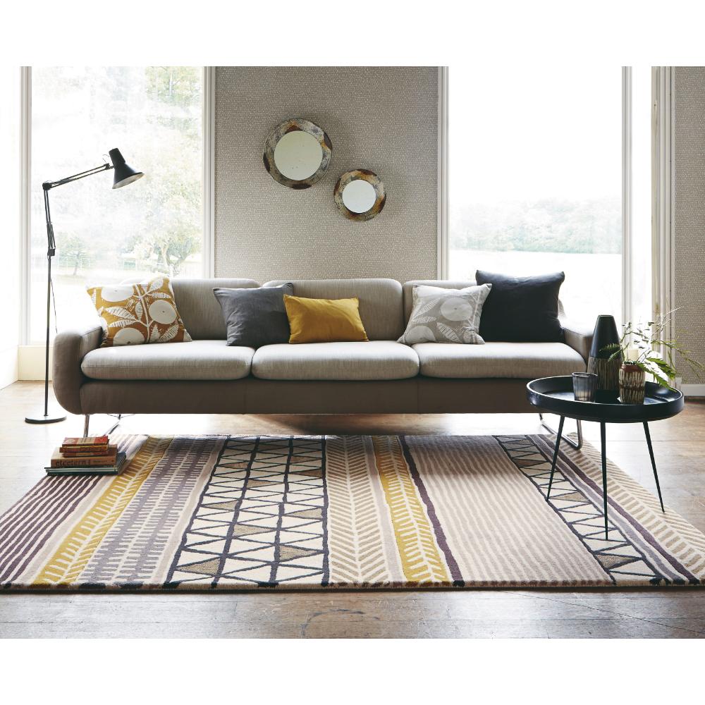 beige geo and stripe wool rug in modern loungeroom - MyHouse