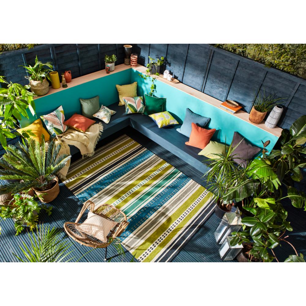 green and blue stripe indoor/outdoor rug on patio - MyHouse