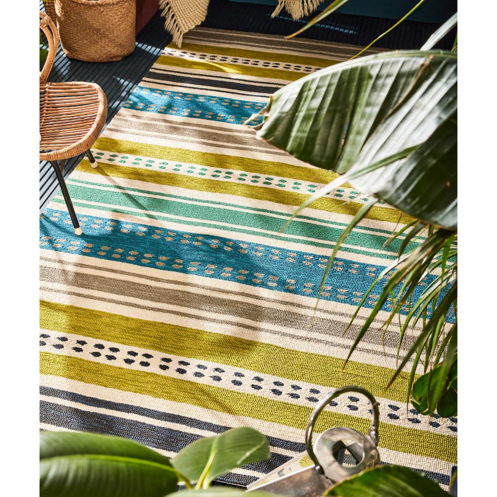 green and blue stripe indoor/outdoor rug on patio - MyHouse