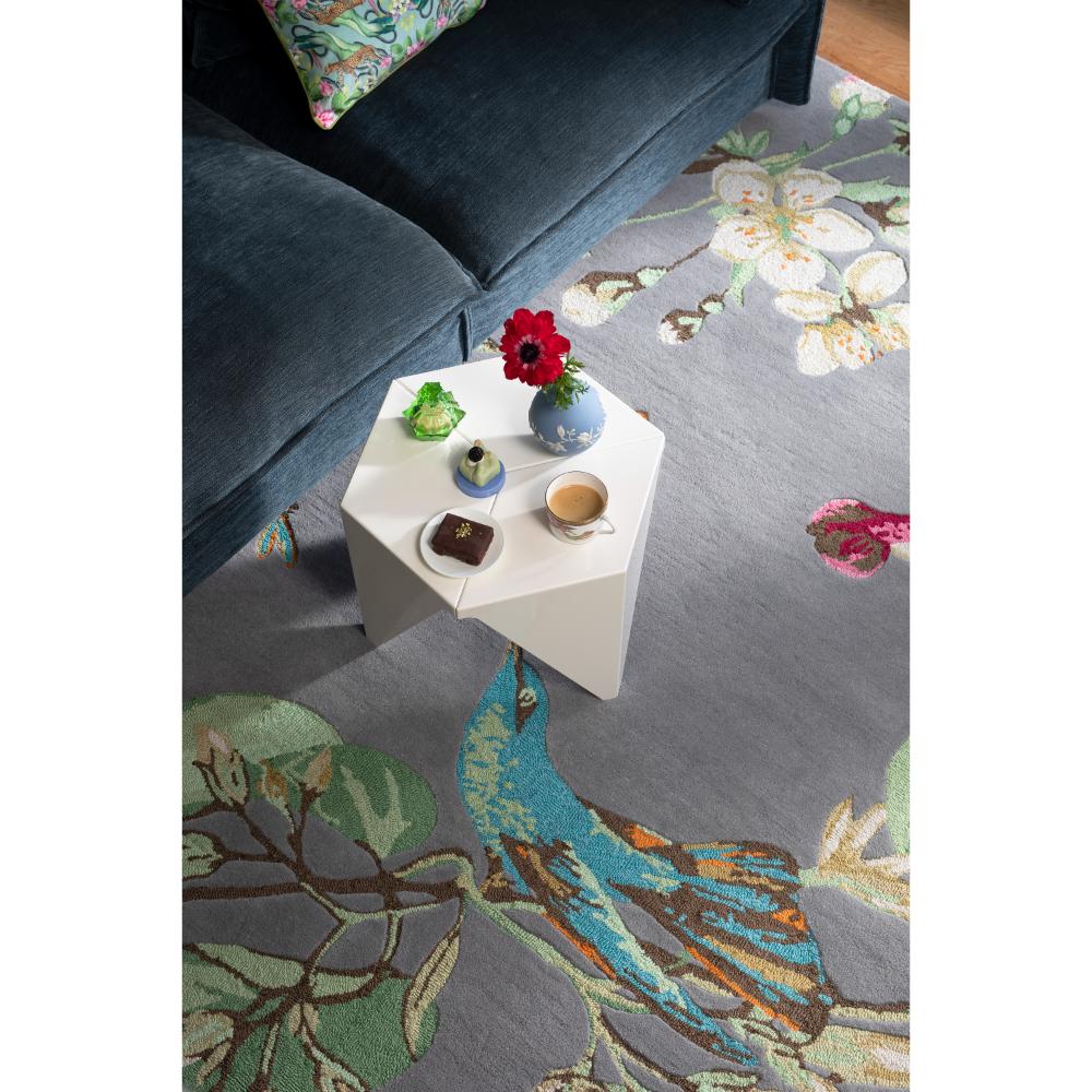 Hummingbird and floral grey wool rug in loungeroom - MyHouse