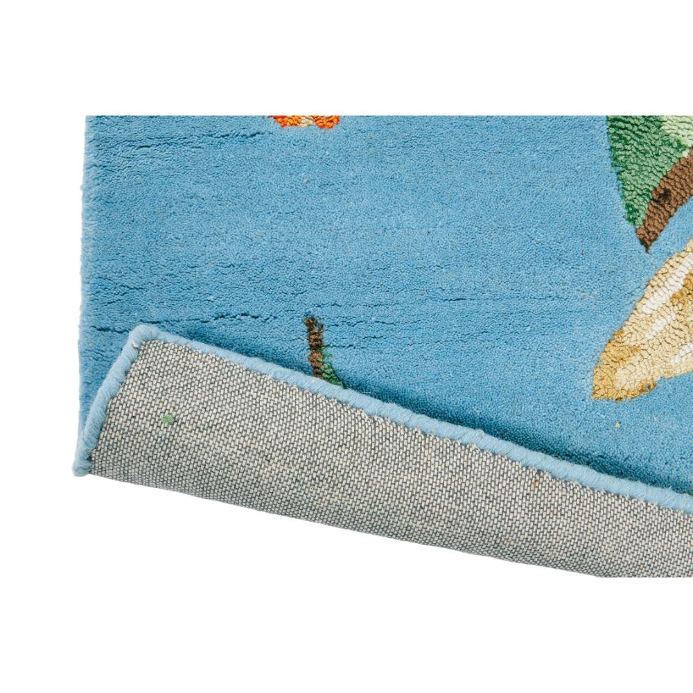 Hummingbird and floral blue wool rug detailed image - MyHouse
