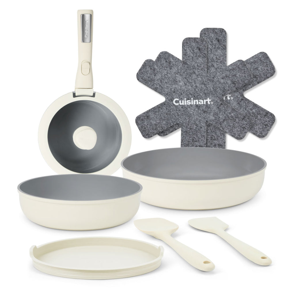 Cuisinart cookware set showing a frying pan, two skillets, 1 8 inch and one 12 inch, a storage lid and two stirring spoons.