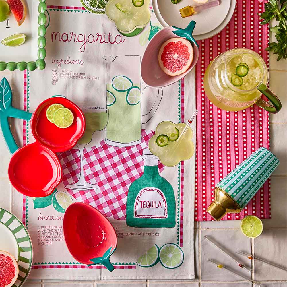 calypso tropical inspired outdoor dining table setup