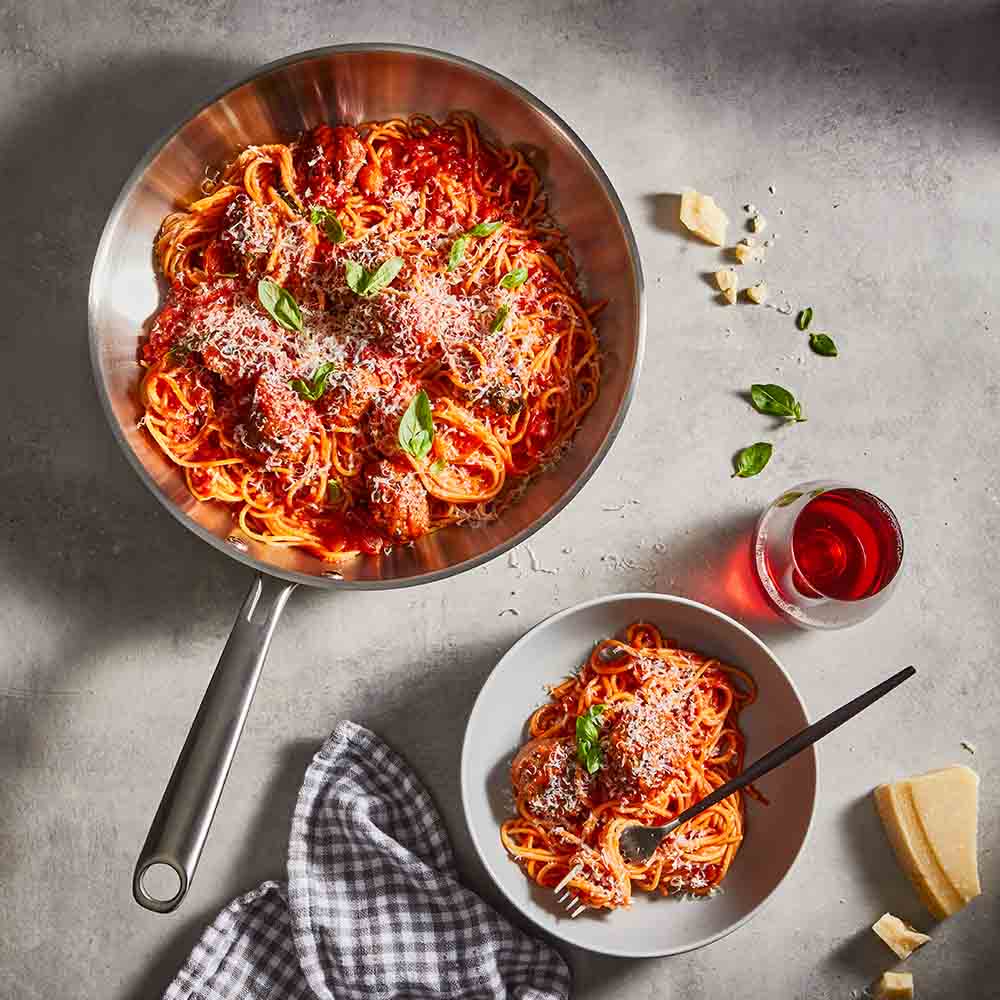 Baccarat Gourmet Stainless Steel Frypan 30cm with spaghetti bolognaise on a grey kitchen counter at MyHouse