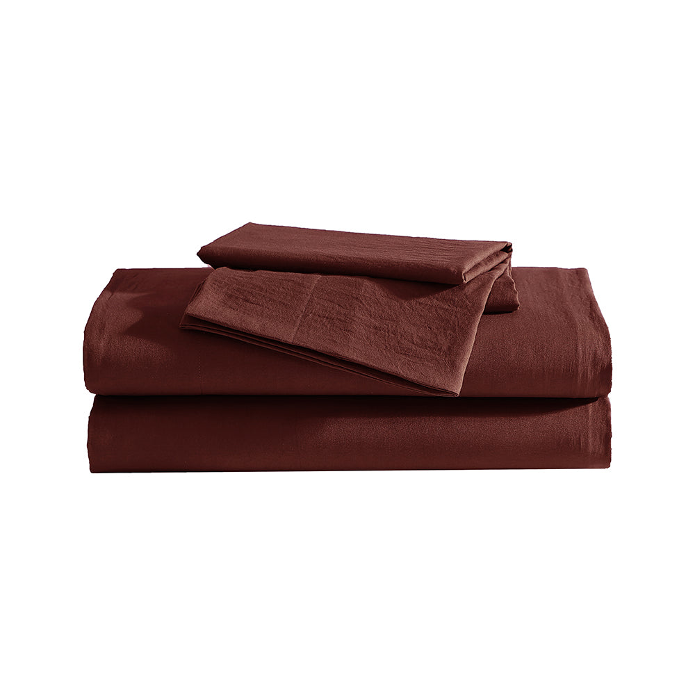 Ardor Boudoir Vintage Washed rust sheet set folded and stacked with matching pillowcases
