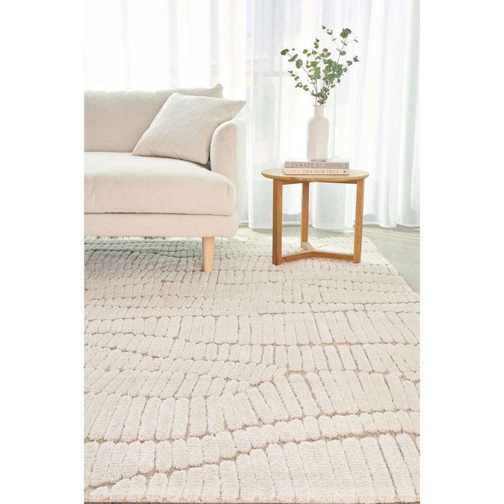 Natural beige waves rug with lounge and side table - MyHouse
