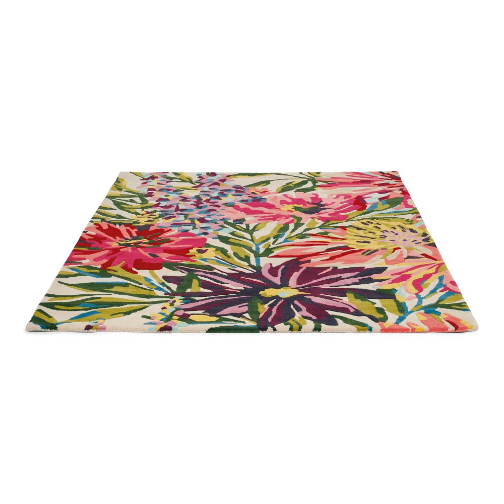 vibrant pink and purple flower wool rug  angled image - MyHouse