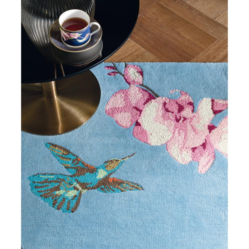 Hummingbird and floral blue wool rug with coffee table - MyHouse