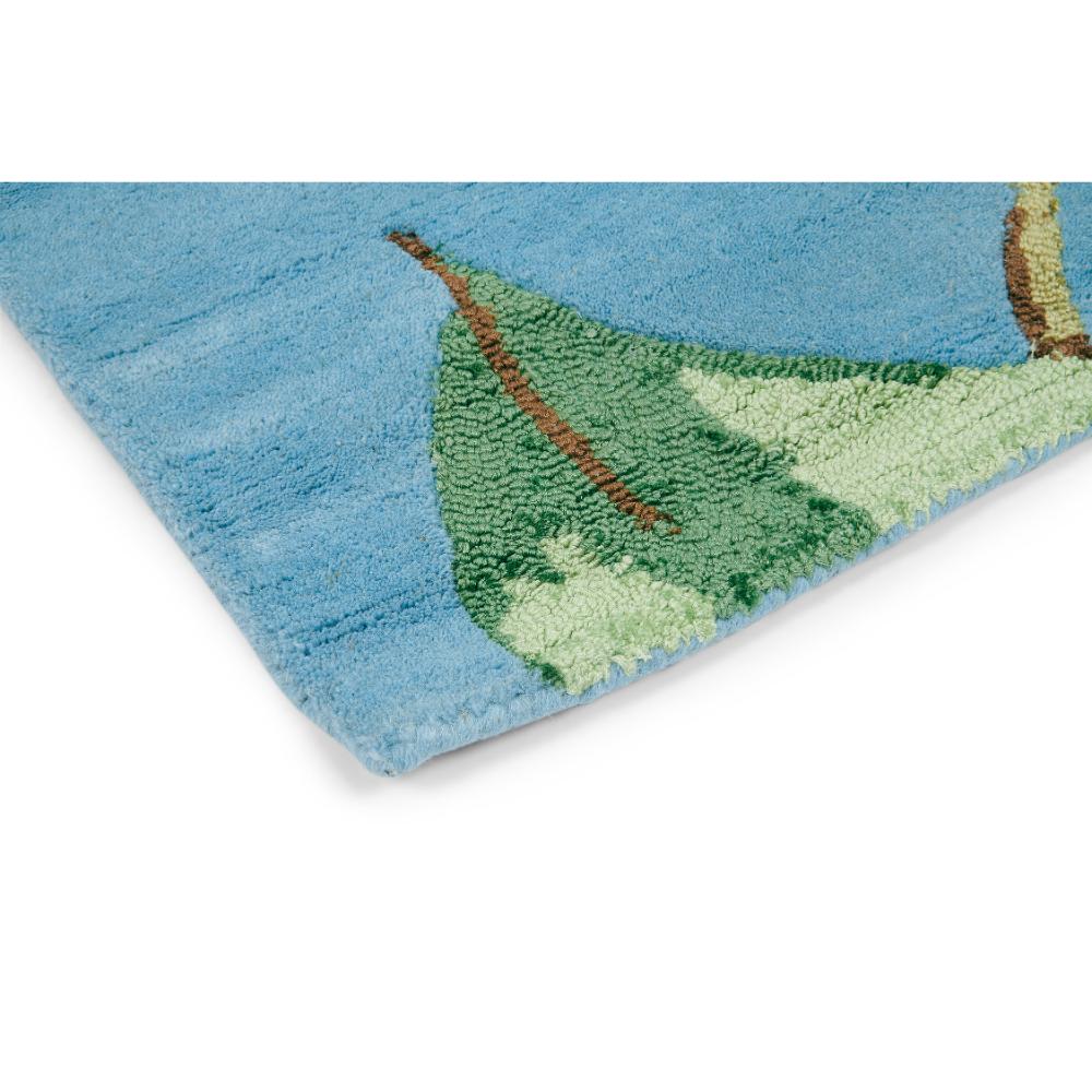 Hummingbird and floral blue wool rug detailed image - MyHouse
